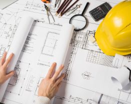 crop-architect-opening-blueprint.jpg